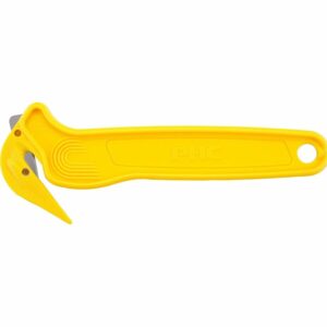 A yellow pipe wrench is laying on the ground.