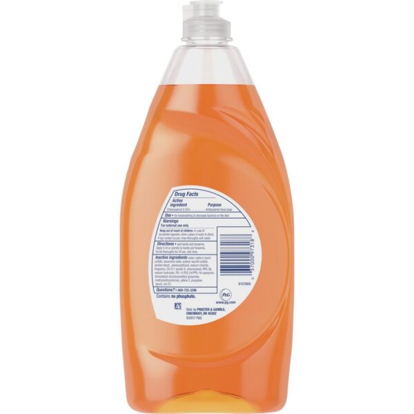 A bottle of orange liquid is shown.