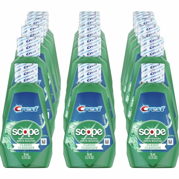 A group of green bottles with toothpaste on them.