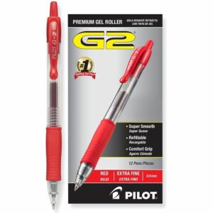 A red gel pen next to a red ball point pen.