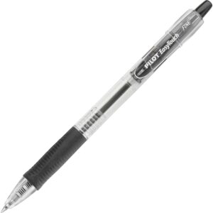 A black and white pen is shown on the ground.