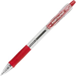 A red pen with white writing on it.